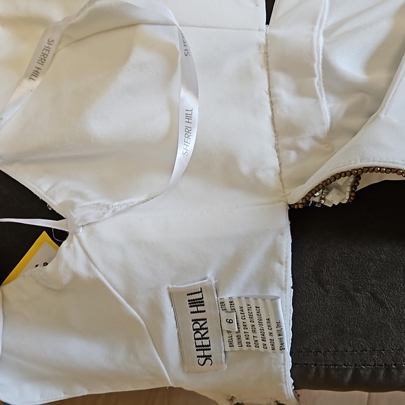 Size 6 white Sherri Hill gown with blue and bronze color tone beadwork - Picture 14 of 15